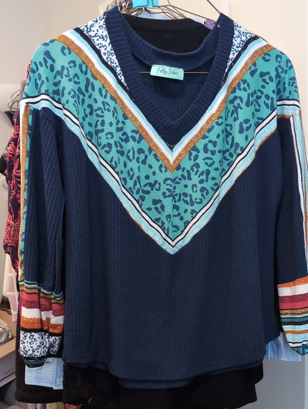 Filly Flair Navy and Teal V-Neck Pullover with Animal Print